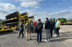 The students' visit to the factory, including the backyard