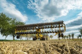 BEDNAR SWIFTERDISC XE disc cultivator lifted for headland turn, showing full disc gangs and high ground clearance
